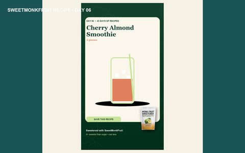 Two creamy cherry almond smoothies with fresh cherries nearby